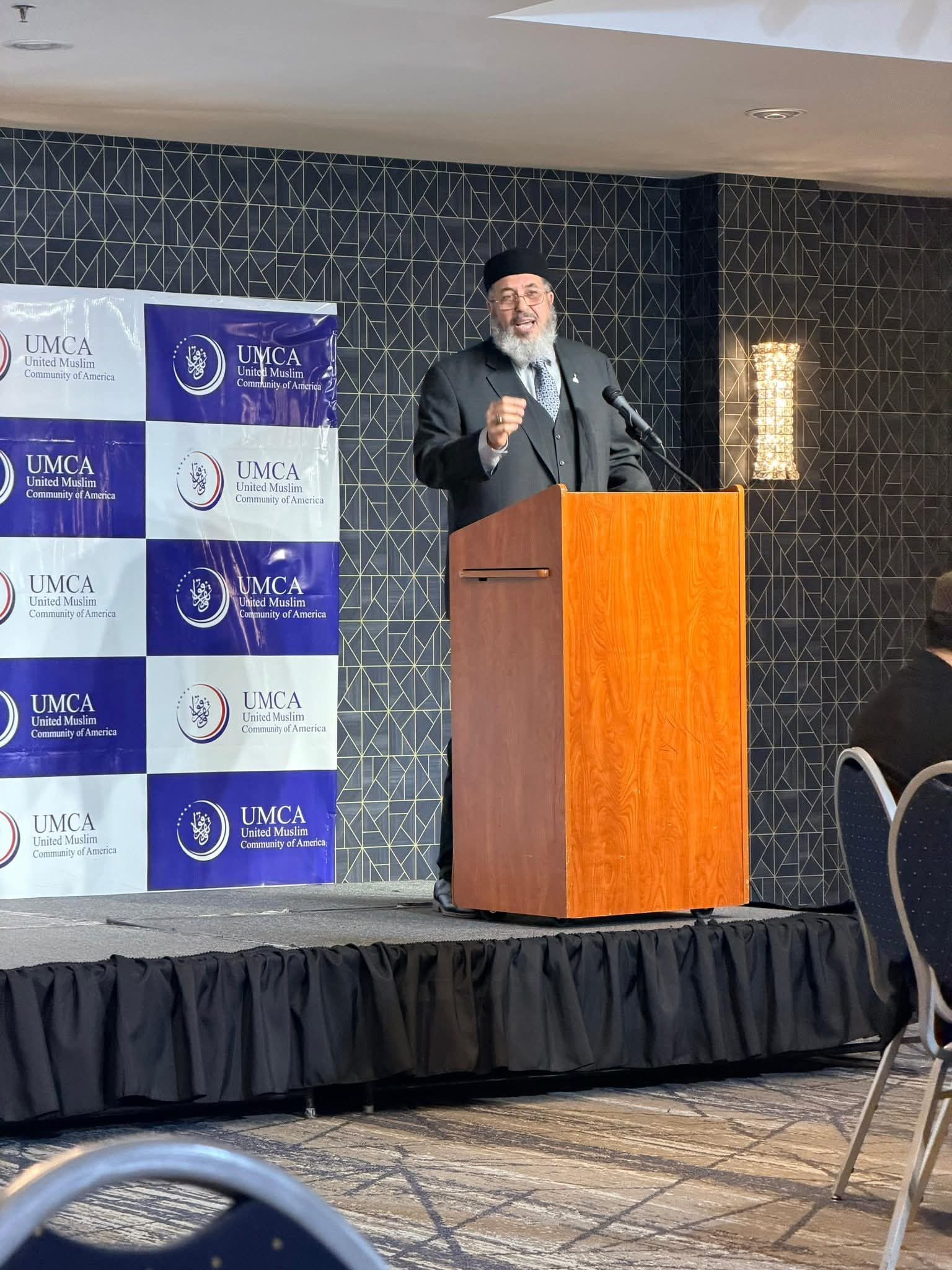 Imam Sherif speaking at the United Muslim Community of America